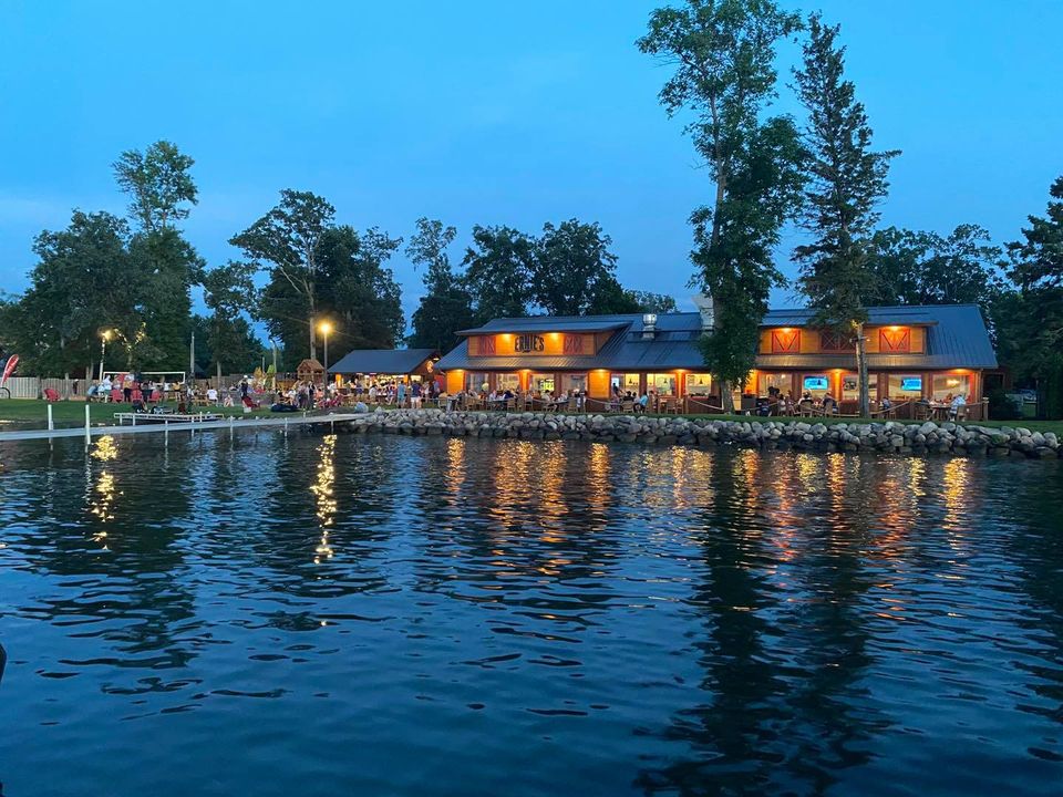 façade of restaurant at dusk from the lake.